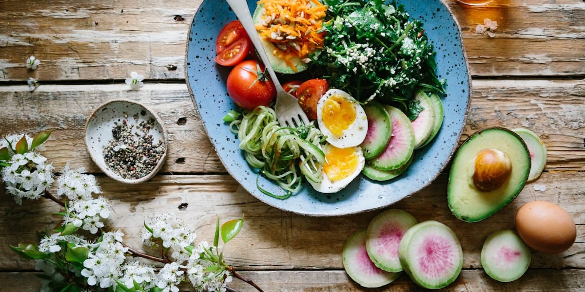 Healthy nutritious foods including fruits, vegetables, and lean proteins for post-liposuction recovery