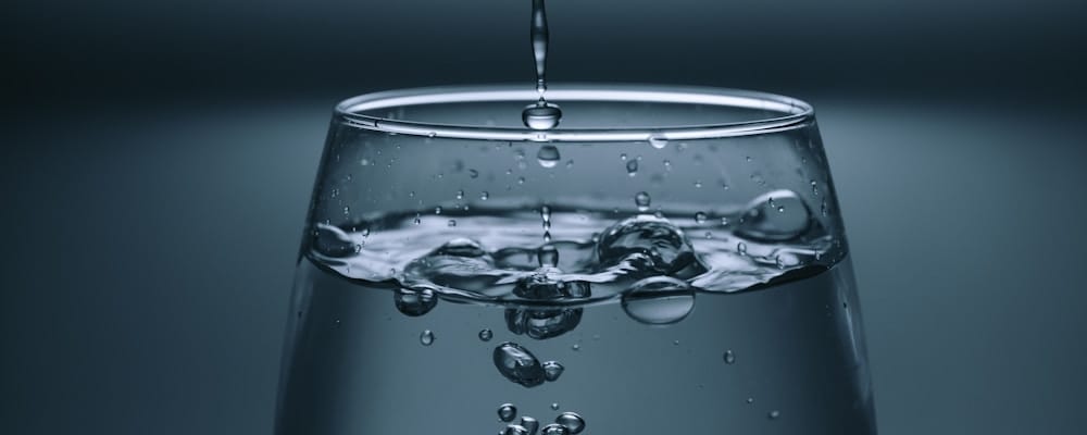 Glass of fresh water with lemon